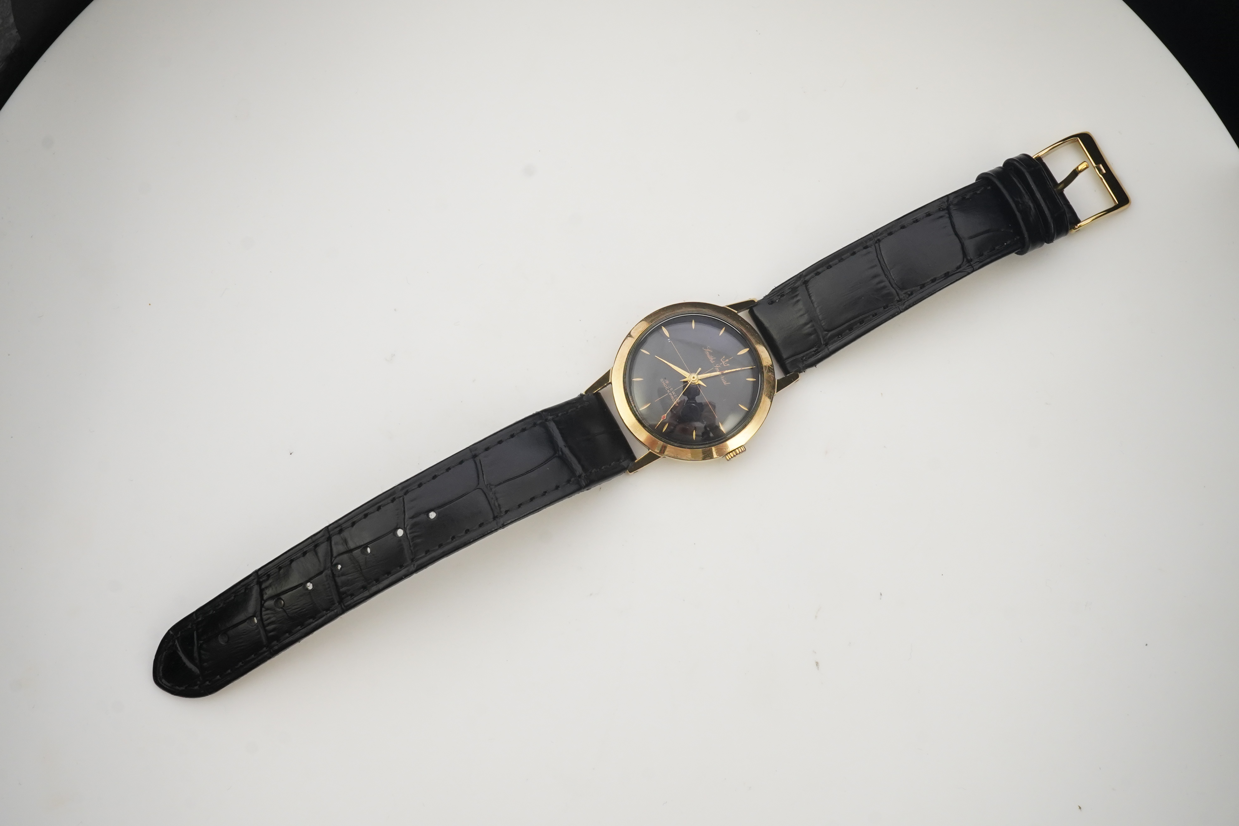 A gentleman's 1950's 9ct gold Smiths Imperial manual wind wrist watch, on a later associated Condor leather strap